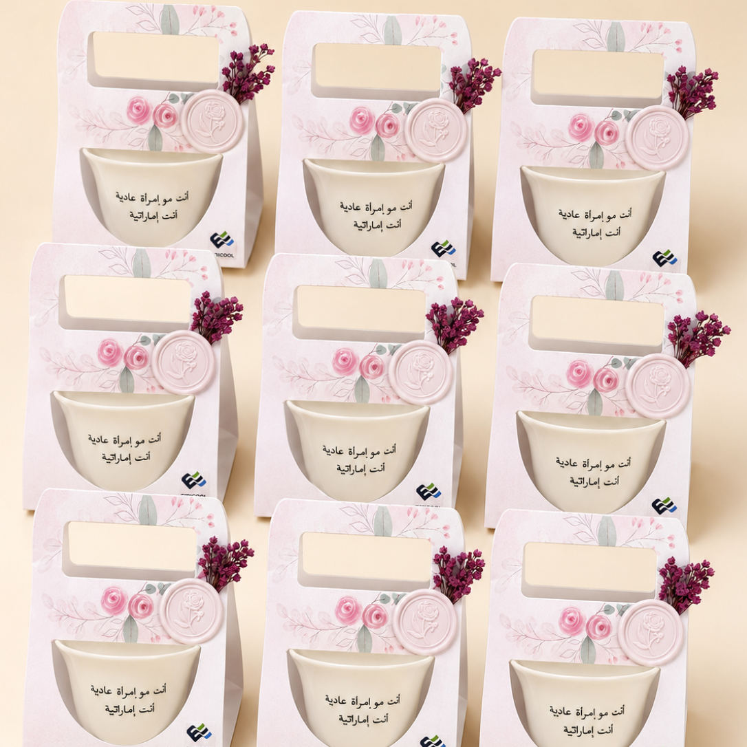 Nine identical decorative gift boxes arranged in a 3x3 grid on a light beige background. Each box is white with pink floral illustrations accents.