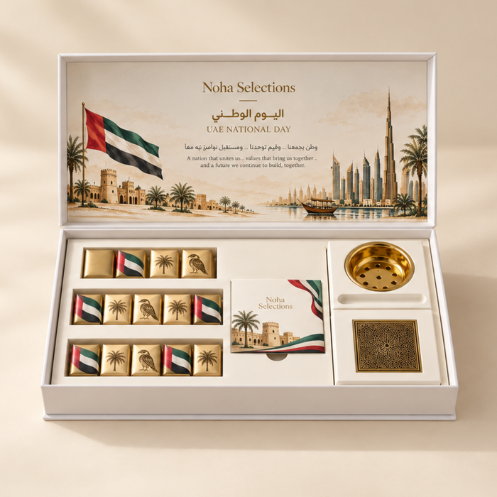 Luxury UAE Heritage VIP gift box featuring a gold metal mabkhara incense burner set, premium foil-wrapped chocolates with UAE heritage emblems, and a commemorative greeting card by Noha Selections.