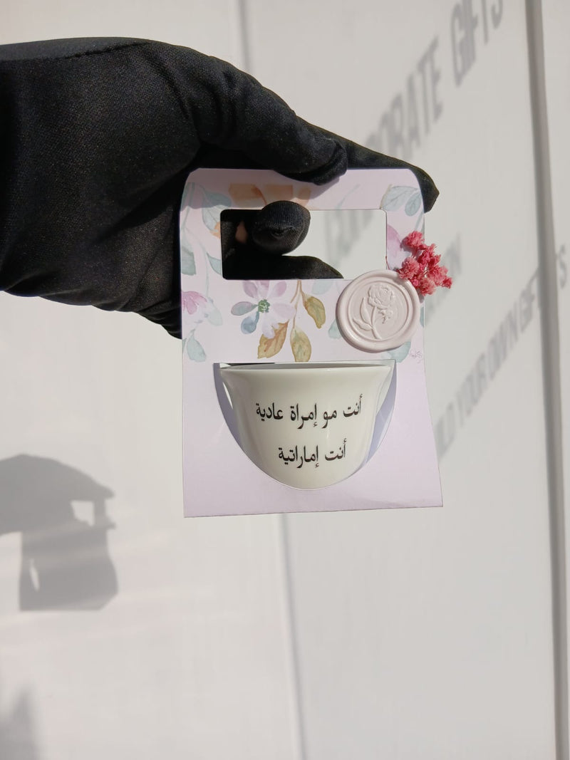 Arabic qahwa cup with emaratie women dubai 