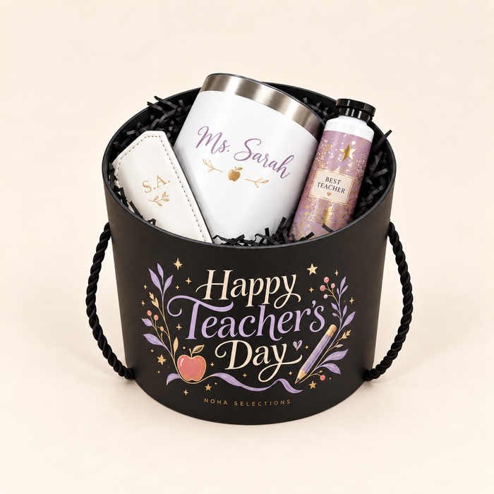 A black Teacher’s Day gift box holds a named white tumbler, an initialled white accessory, and a decorated bottle.