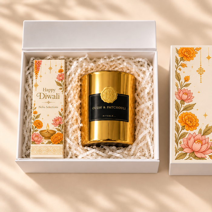A rich oudh fragrance for the season of light. The Rituals Private Collection Oudh & Patchouli candle, wrapped in our hand-illustrated lotus and marigold Diwali box.